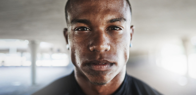 Young man face close up