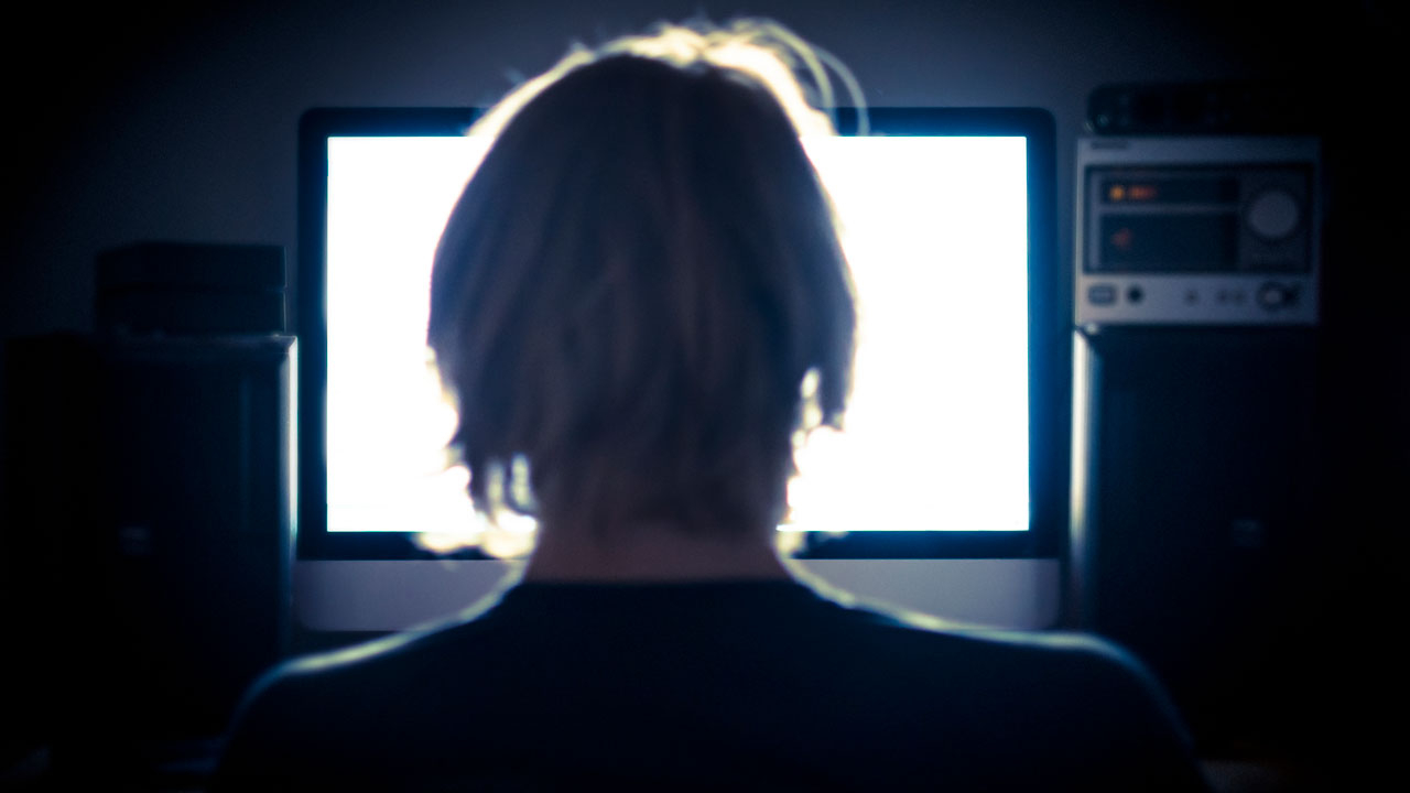 User in front of computer screen