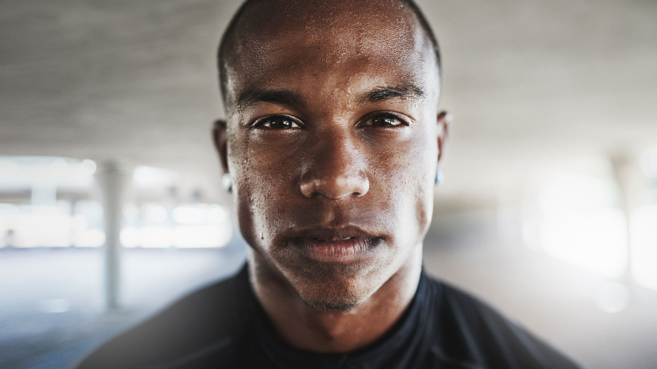 Young man face close up